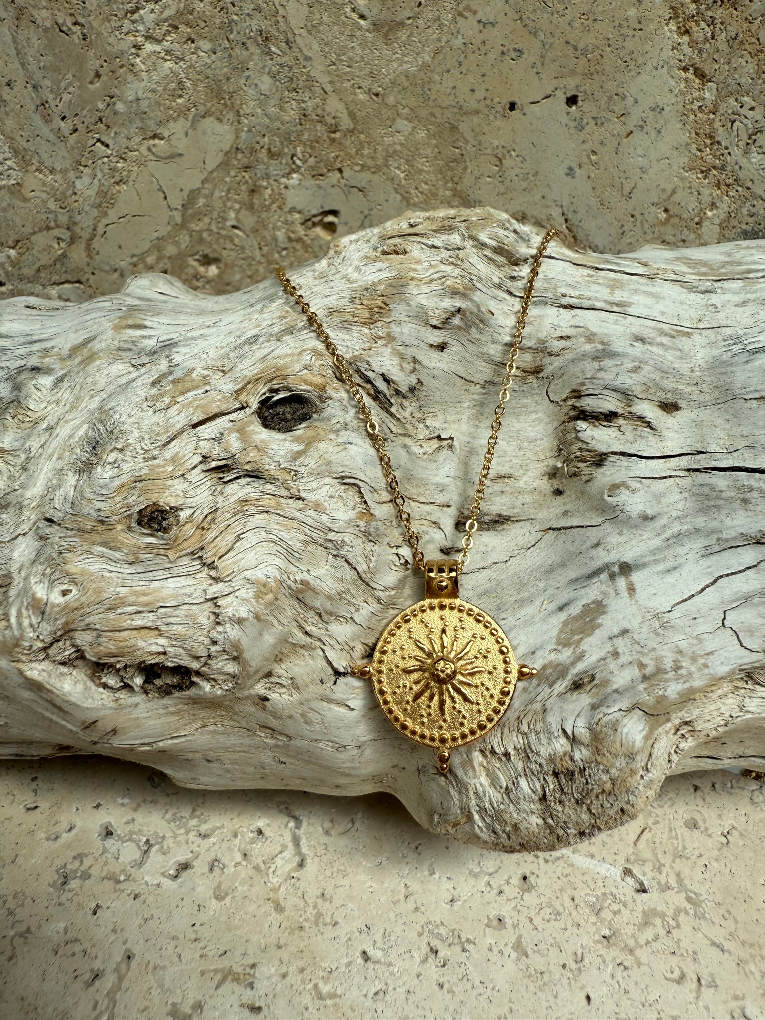 Gold Sun Symbol Necklace